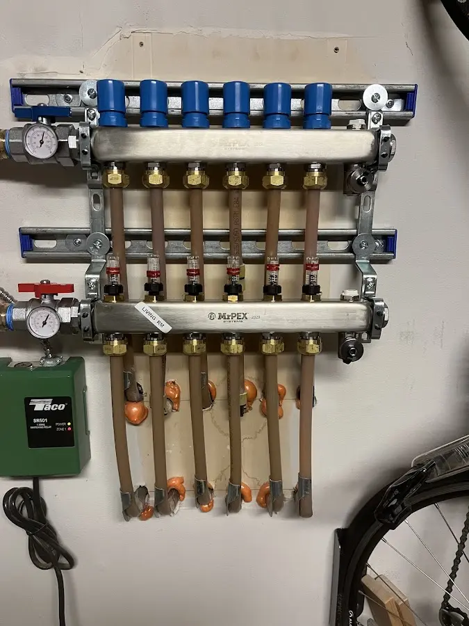 Plumber performing Water Heater Repair at a residential property in Rowlett