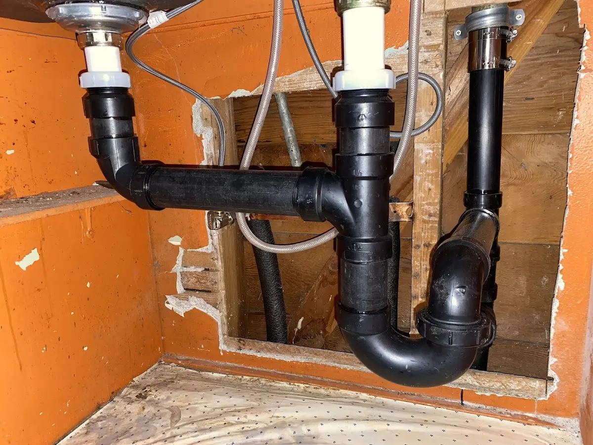 Professional Garbage Disposal Repair equipment and tools on the job in Rowlett